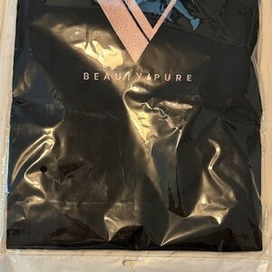 Beauty Pure Black Tee with Pink Accent V-Necknail tech cover